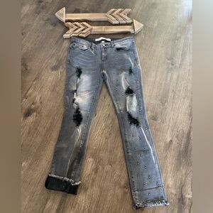 Studded, distressed faded black jeans. Size 3